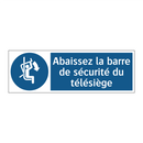 Abaissez la barre de sécurité du télésiège