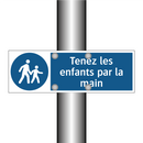 Tenez les enfants par la main