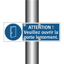 ATTENTION ! Veuillez ouvrir la porte lentement.