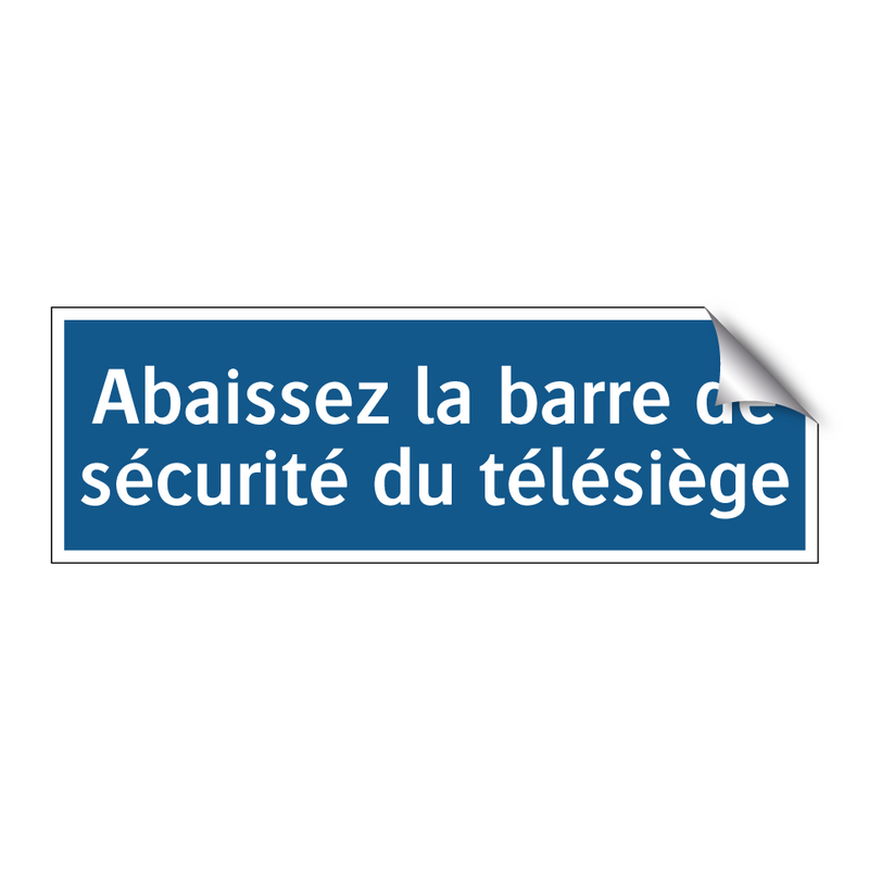 Abaissez la barre de sécurité du télésiège