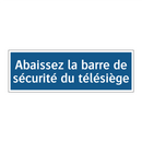 Abaissez la barre de sécurité du télésiège