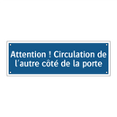 Attention ! Circulation de l'autre côté de la porte
