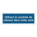 Utilisez le système de retenue dans cette zone
