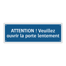 ATTENTION ! Veuillez ouvrir la porte lentement.