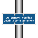 ATTENTION ! Veuillez ouvrir la porte lentement.