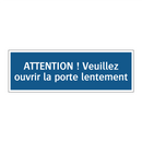 ATTENTION ! Veuillez ouvrir la porte lentement.
