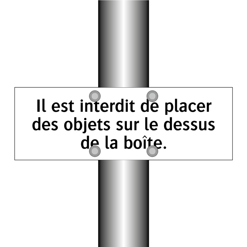 Il est interdit de placer des objets sur le dessus de la boîte.