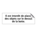 Il est interdit de placer des objets sur le dessus de la boîte.