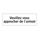 Veuillez vous approcher de l'urinoir