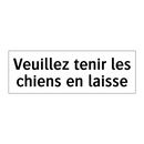 Veuillez tenir les chiens en laisse
