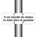 Il est interdit de mettre la main dans la goulotte