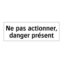 Ne pas actionner, danger présent
