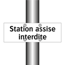 Station assise interdite