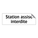 Station assise interdite