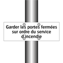 Garder les portes fermées sur ordre du service d'incendie