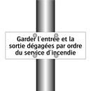 Garder l'entrée et la sortie dégagées par ordre du service d'incendie