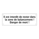 Il est interdit de rester dans la zone de balancement ! Danger de mort !
