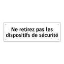 Ne retirez pas les dispositifs de sécurité