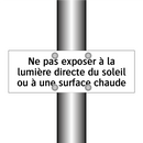 Ne pas exposer à la lumière directe du soleil ou à une surface chaude