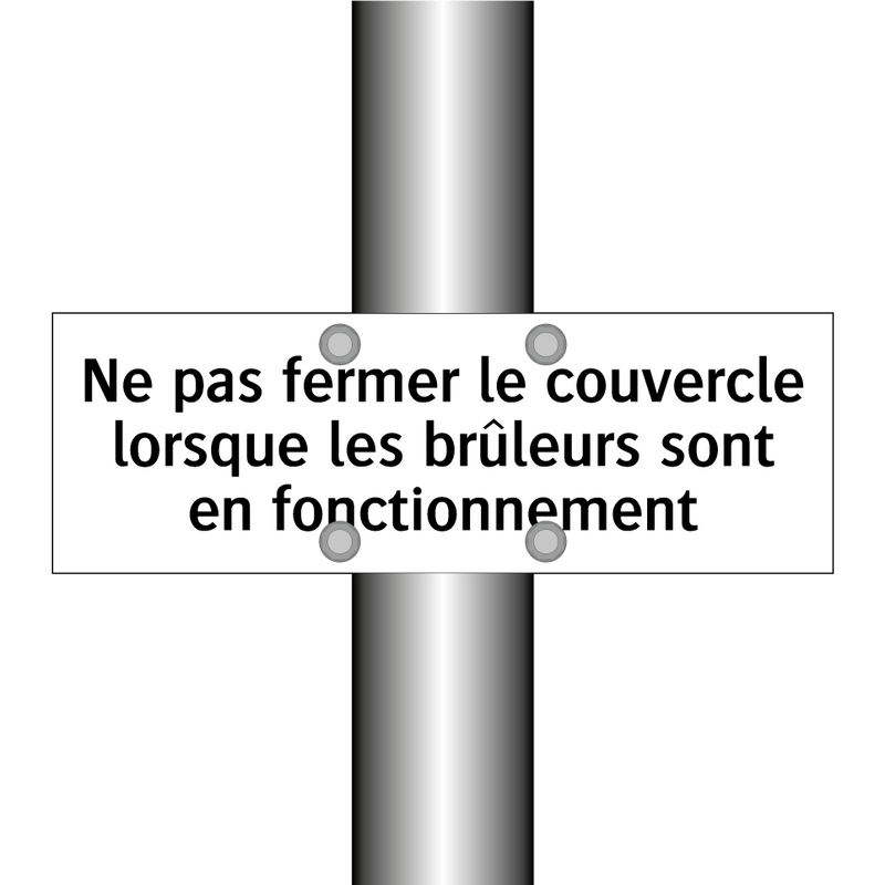 Ne pas fermer le couvercle lorsque les brûleurs sont en fonctionnement