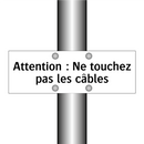 Attention : Ne touchez pas les câbles