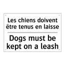 Les chiens doivent être tenus  /.../ - Dogs must be kept on a leash