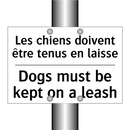Les chiens doivent être tenus  /.../ - Dogs must be kept on a leash