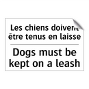 Les chiens doivent être tenus  /.../ - Dogs must be kept on a leash