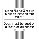 Les chiens doivent être tenus  /.../ - Dogs must be kept on a leash at  /.../