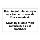 Il est interdit de nettoyer les  /.../ - Cleaning clothes with compressed  /.../