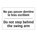 Ne pas passer derrière le bras  /.../ - Do not step behind the swing arm /.../