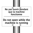 Ne pas ouvrir pendant que la machine  /.../ - Do not open while the machine  /.../
