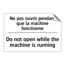 Ne pas ouvrir pendant que la machine  /.../ - Do not open while the machine  /.../