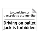 La conduite sur transpalette est  /.../ - Driving on pallet jack is forbidden /.../