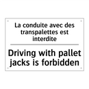 La conduite avec des transpalettes  /.../ - Driving with pallet jacks is forbidden /.../