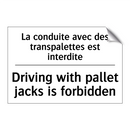 La conduite avec des transpalettes  /.../ - Driving with pallet jacks is forbidden /.../