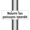 Nourrir les poissons interdit