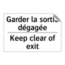Garder la sortie dégagée - Keep clear of exit