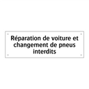 Réparation de voiture et changement de pneus interdits