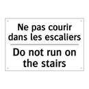 Ne pas courir dans les escaliers /.../ - Do not run on the stairs
