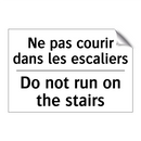Ne pas courir dans les escaliers /.../ - Do not run on the stairs