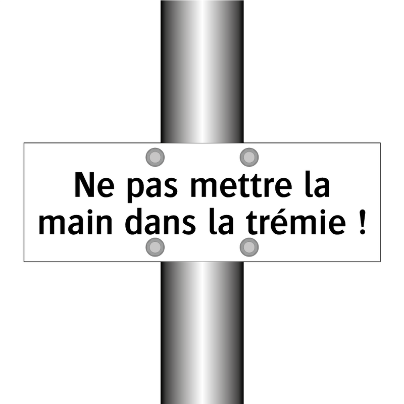 Ne pas mettre la main dans la trémie !