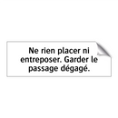 Ne rien placer ni entreposer. Garder le passage dégagé.