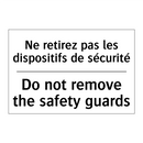 Ne retirez pas les dispositifs  /.../ - Do not remove the safety guards /.../