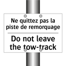 Ne quittez pas la piste de remorquage /.../ - Do not leave the tow-track