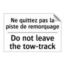 Ne quittez pas la piste de remorquage /.../ - Do not leave the tow-track
