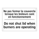 Ne pas fermer le couvercle lorsque  /.../ - Do not shut lid when burners are  /.../
