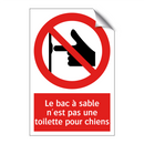 Le bac à sable n'est pas une toilette pour chiens