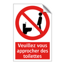 Veuillez vous approcher des toilettes