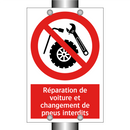 Réparation de voiture et changement de pneus interdits